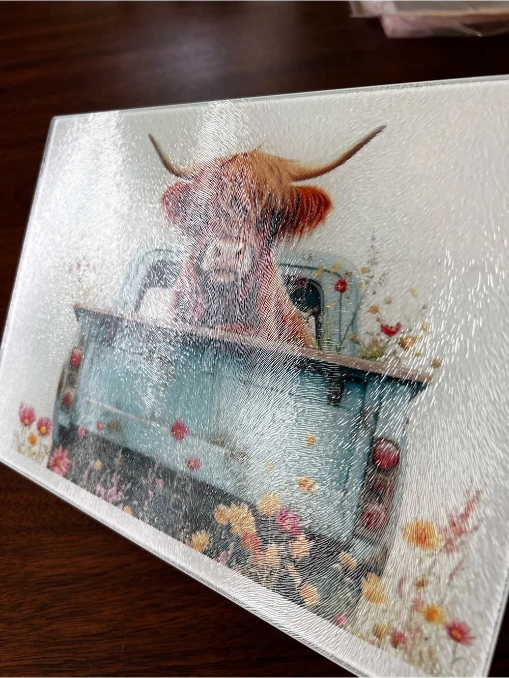 Highland Cow in Vintage Blue Truck glass cutting board